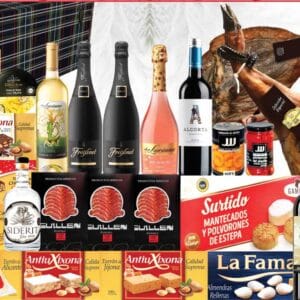 Lote 35 en baúl de madera: paleta ibérica o jamón serrano, Chivas 12, Siderit, 3 cavas, 5 vinos, ibéricos y dulces
